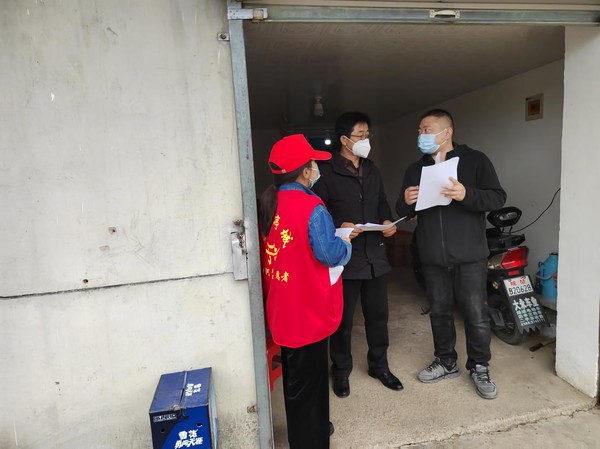 沙河镇新塘村志愿者宣传疫情防控知识.png