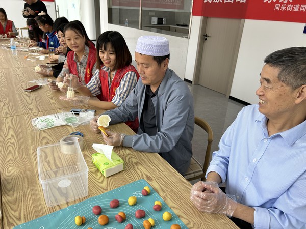 滁州市南谯区同乐街道同乐社区新时代文明实践站，2023年9月26日上午，开展“民族团结一家亲 以侨为桥庆中秋”主题活动1.jpg