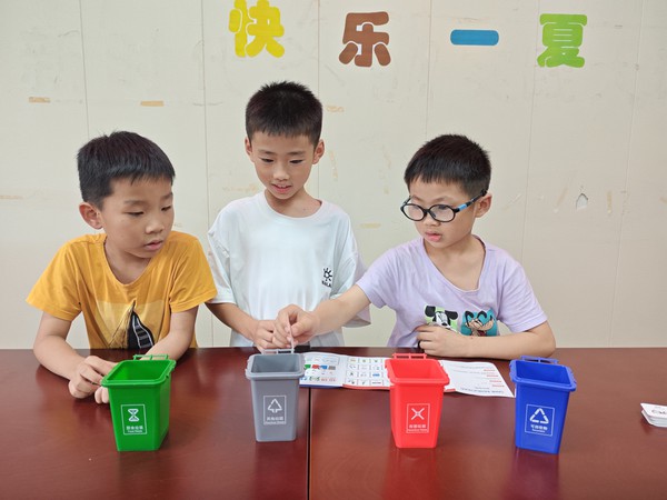 2026年7月23日腰铺社区新时代文明实践站“童心协力 “圾”时行动——垃圾分类主题宣传活动2.jpg